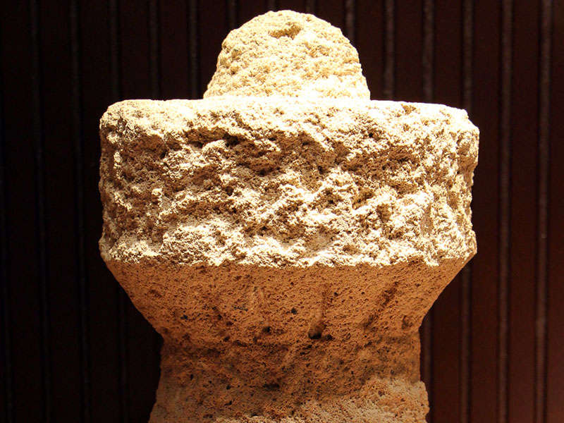 Detailed view of the basalt block masonry and tholos structures
